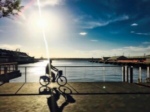 man bicycling through the streets of san diego alcohol rehab sunny treatment mental health