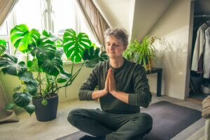 what is mindfulness yoga sport man fitness meditation mat position relaxation body healthy lifestyle lifestyle sitting plants