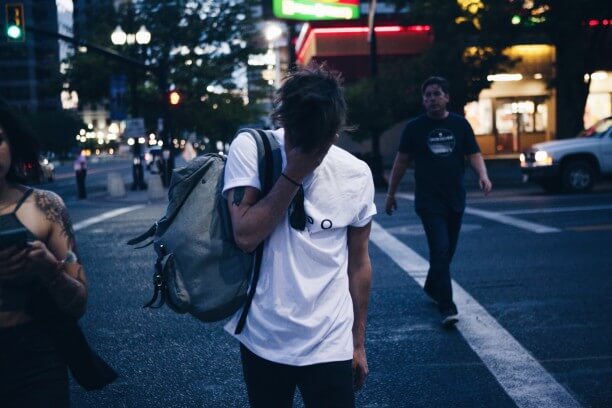 Treating stress no face walking street city overwhelmed